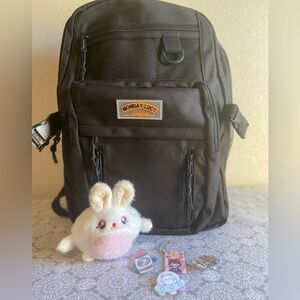 Monday Lucy~Jingpin~NWOT~Kids~Unisex~Adjustable~
Backpack~Multiple Compartments